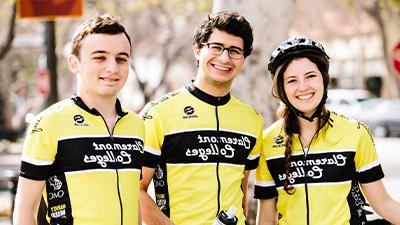 Students wearing bicycle revolution jerseys. 